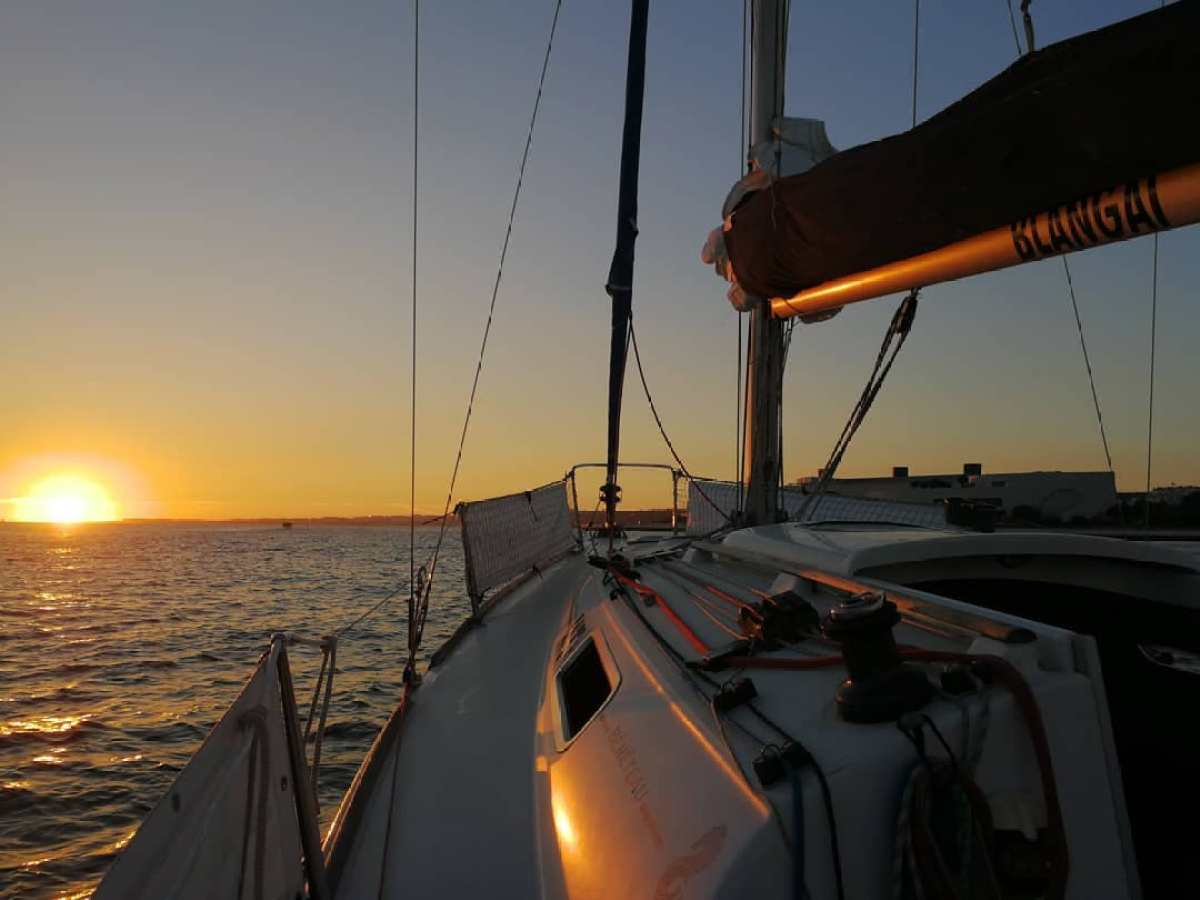 Sunset enjoyed from the sea in Lisbon