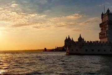 Sunset over Lisbon sea and city