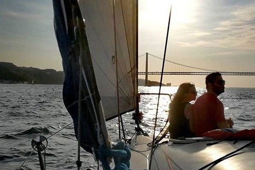 couple enjoying sunset on board